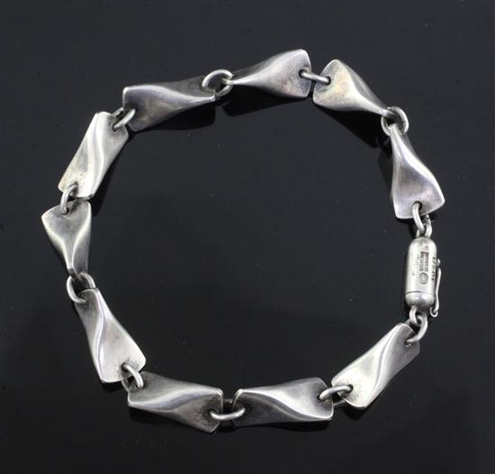 An Edward Klint Larsen for Georg Jensen sterling silver bracelet, no. 104A, 1915-1927 mark, 21cm.